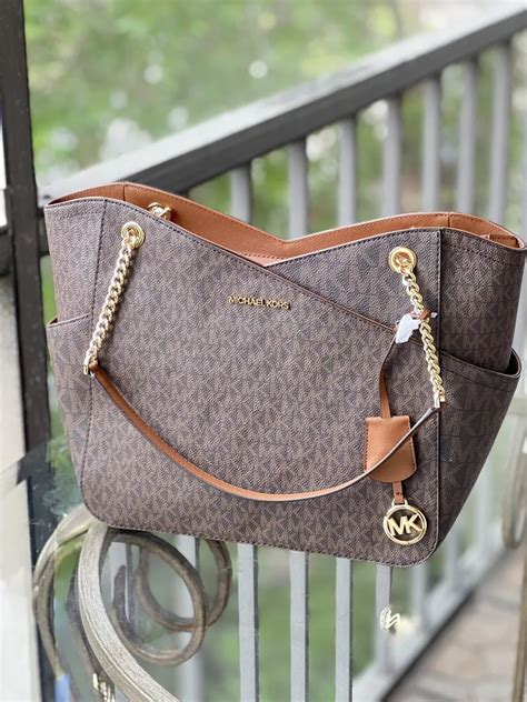 appraise michael kors purse|Michael Kors antiques worth.